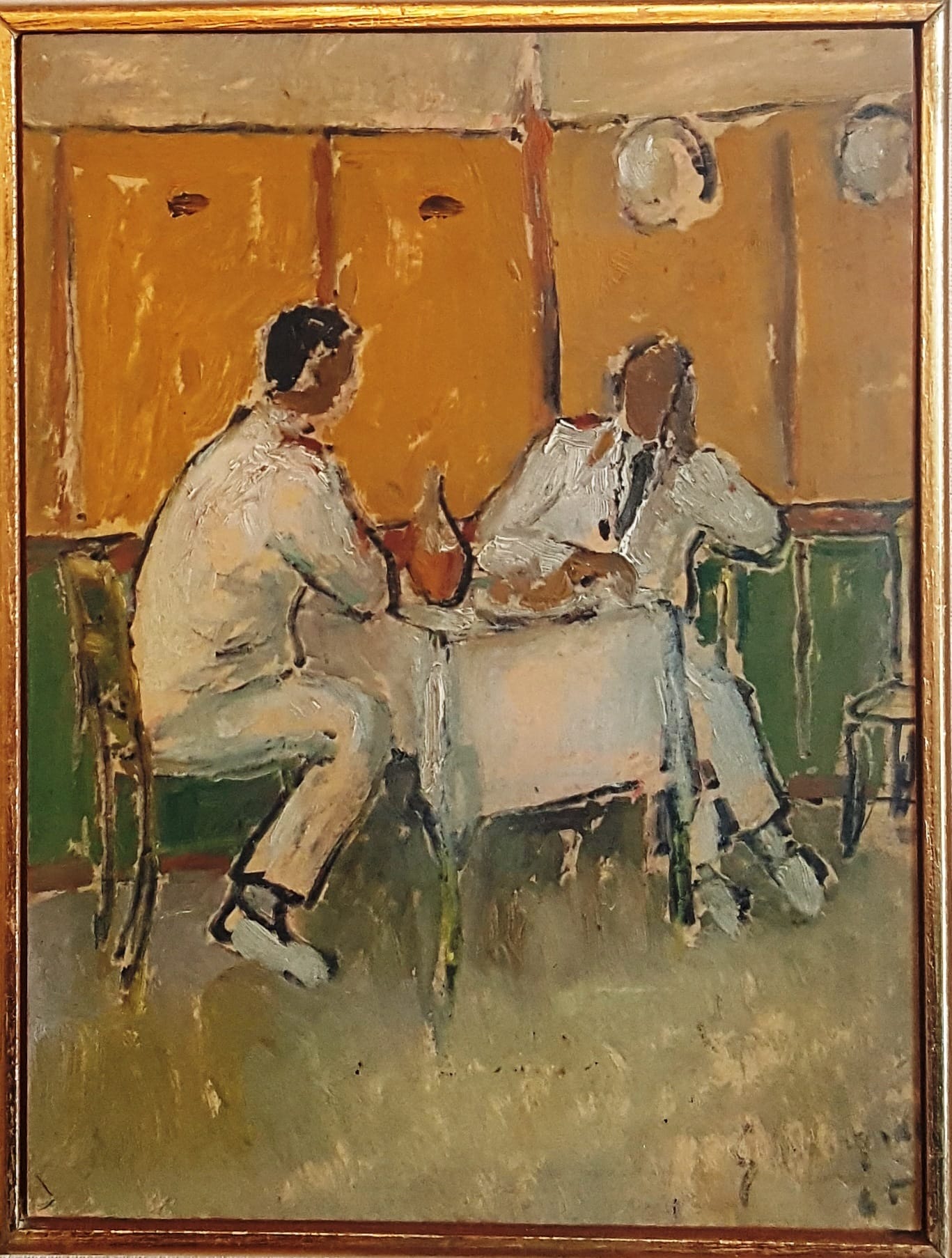 Malagodi's Conversation. Two men in white suits, sitting in a casual, relaxed posture, converse in a small dining room. The walls are yellow with green baseboard.